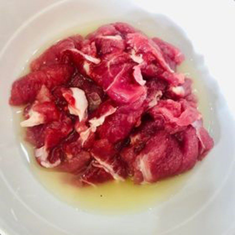 Step 1 Prepare and marinate the beef for Raw Beef Salad with Lime and Onion