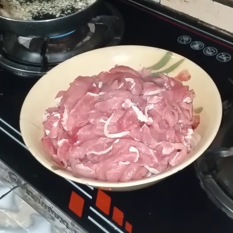 Step 1 Prepare and Marinate the Pork Stir-Fried Pork with Green Starfruit and Banana