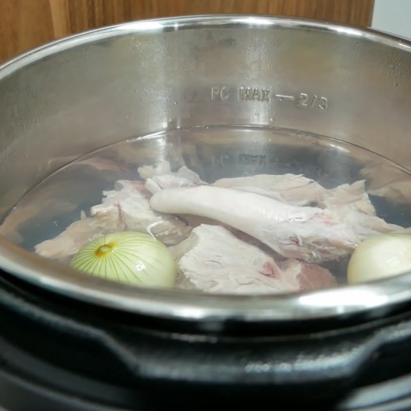 Step 1 Prepare the pork bones and simmer the broth for Tom Yum Hot Pot