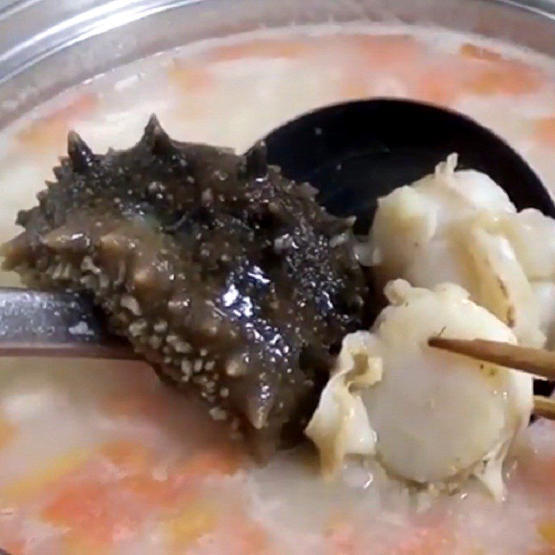 Step 5 Cook the porridge Sea cucumber scallop porridge