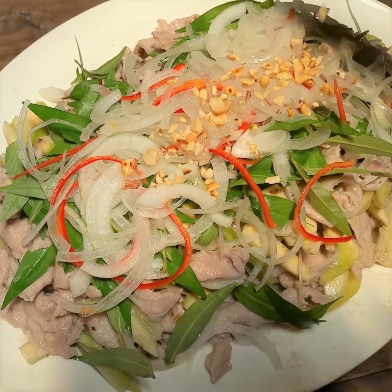 Step 5 Final product Stir-fried pork with green banana and starfruit