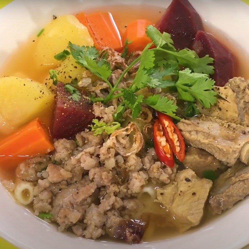 Step 7 Finished product Pork rib noodle soup with vegetables