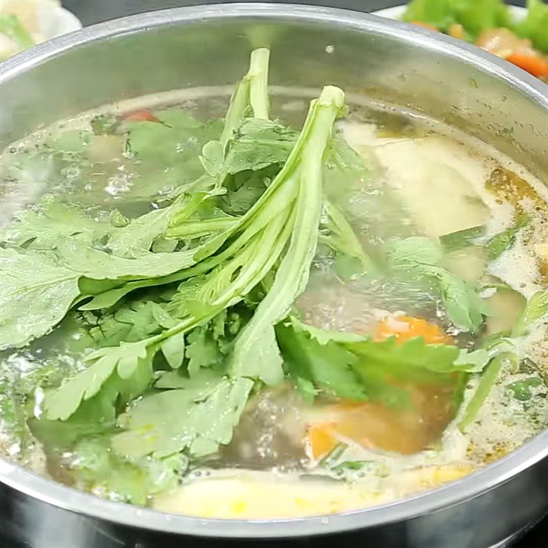 Step 5 Final product Pork tail hot pot with Chinese medicinal spices