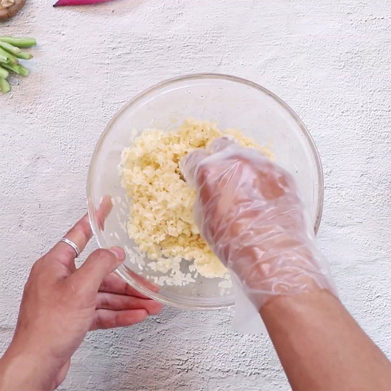 Step 2 Mix rice with eggs for Steamed Egg Rice with Lotus Leaf
