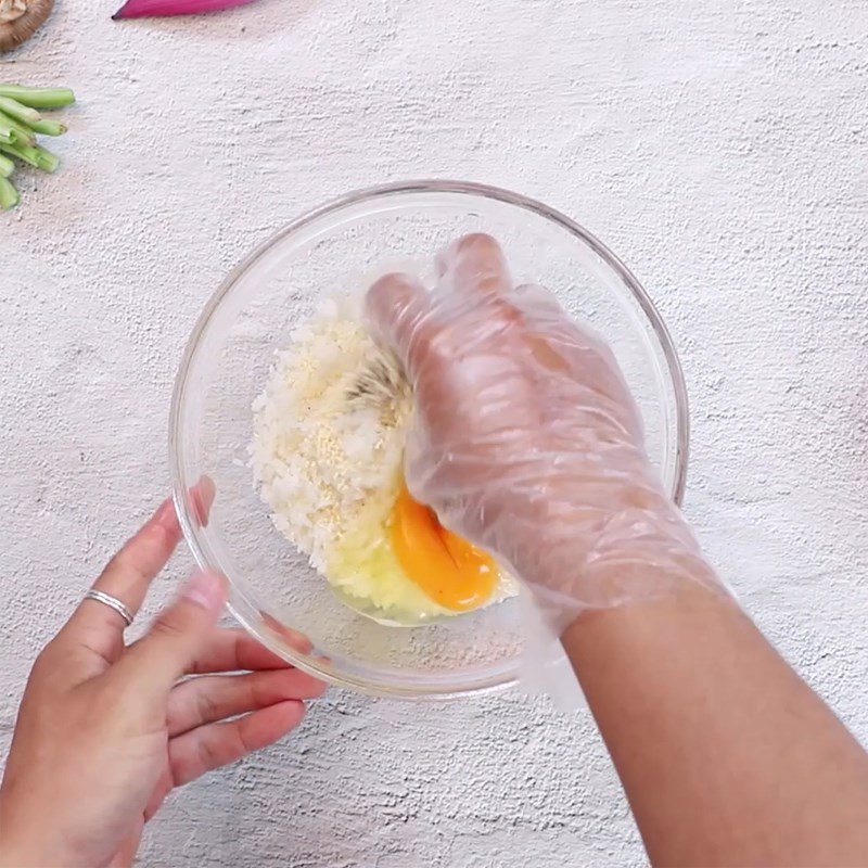 Step 2 Mix rice with eggs for Steamed Egg Rice with Lotus Leaf