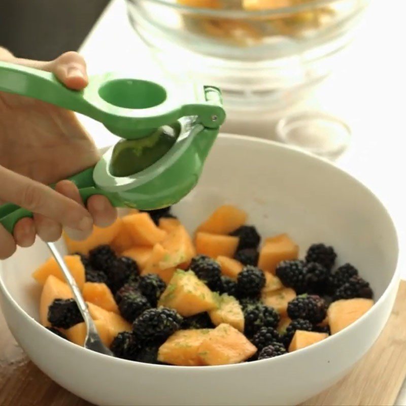 Step 2 Mix fruit sugar for melon raspberry salad