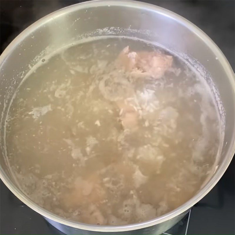 Step 2 Mix rice and cook bones Chao Tieu