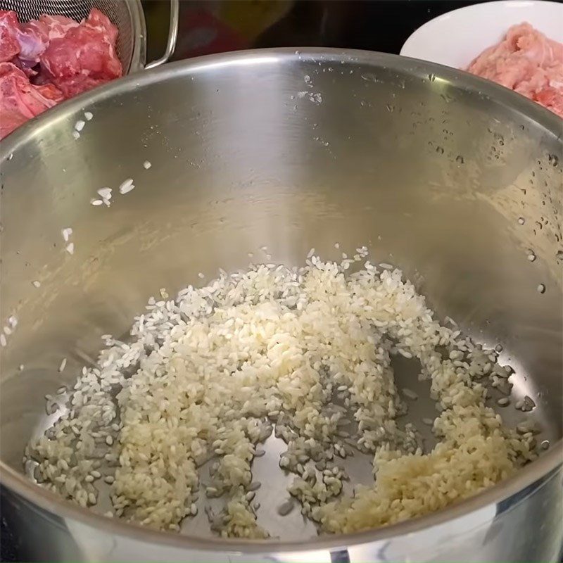Step 2 Mix rice and cook bones Chao Tieu