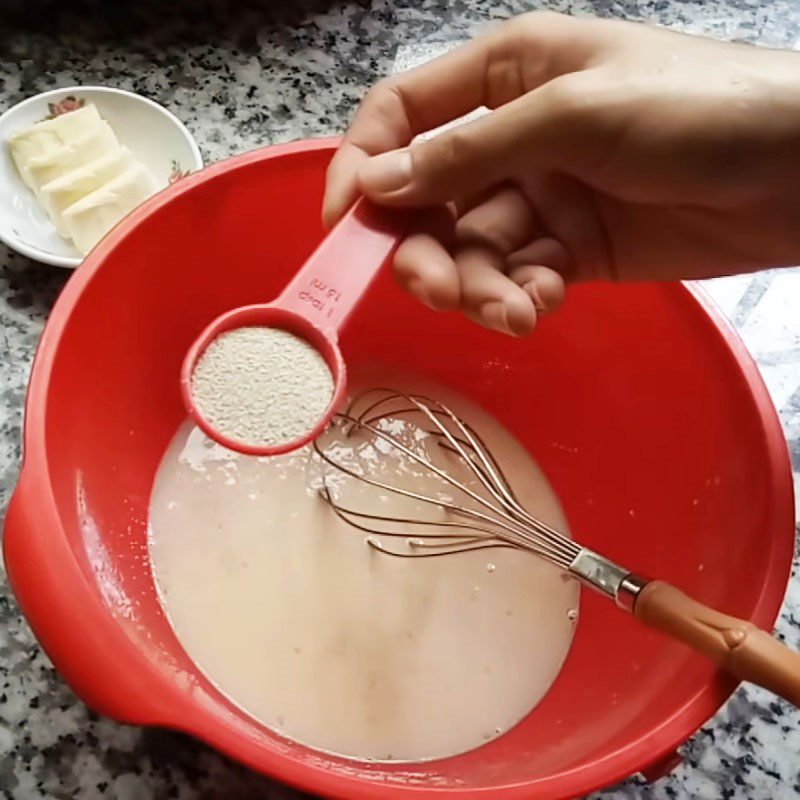 Step 1 Mix the egg and milk mixture and activate the yeast for Butter Milk Bread in a non-stick pan