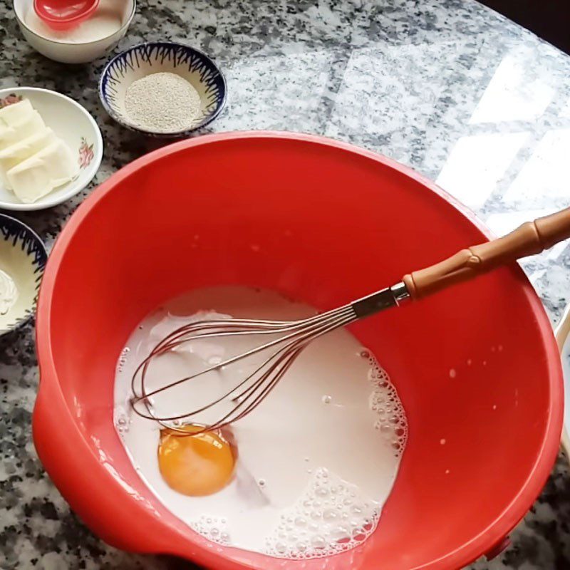 Step 1 Mix the egg and milk mixture and activate the yeast for Butter Milk Bread in a non-stick pan