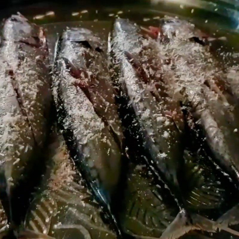 Step 2 Marinating the fish Fish wrapped in foil