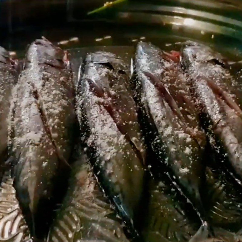 Step 2 Marinating the fish Fish wrapped in foil