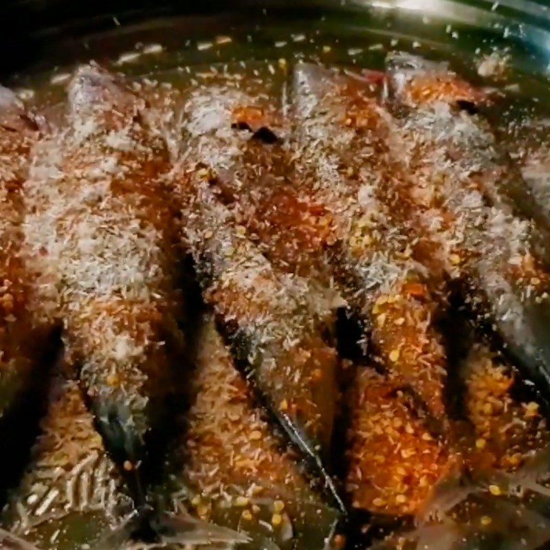 Step 2 Marinating the fish Fish wrapped in foil