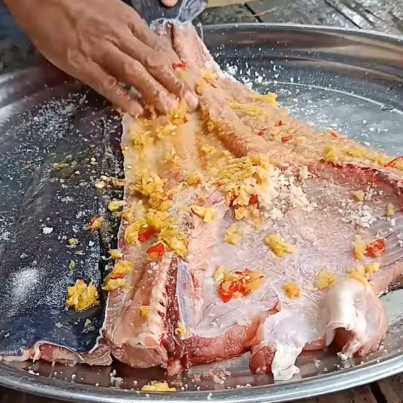 Step 3 Marinating catfish Dried catfish marinated with ginger and chili