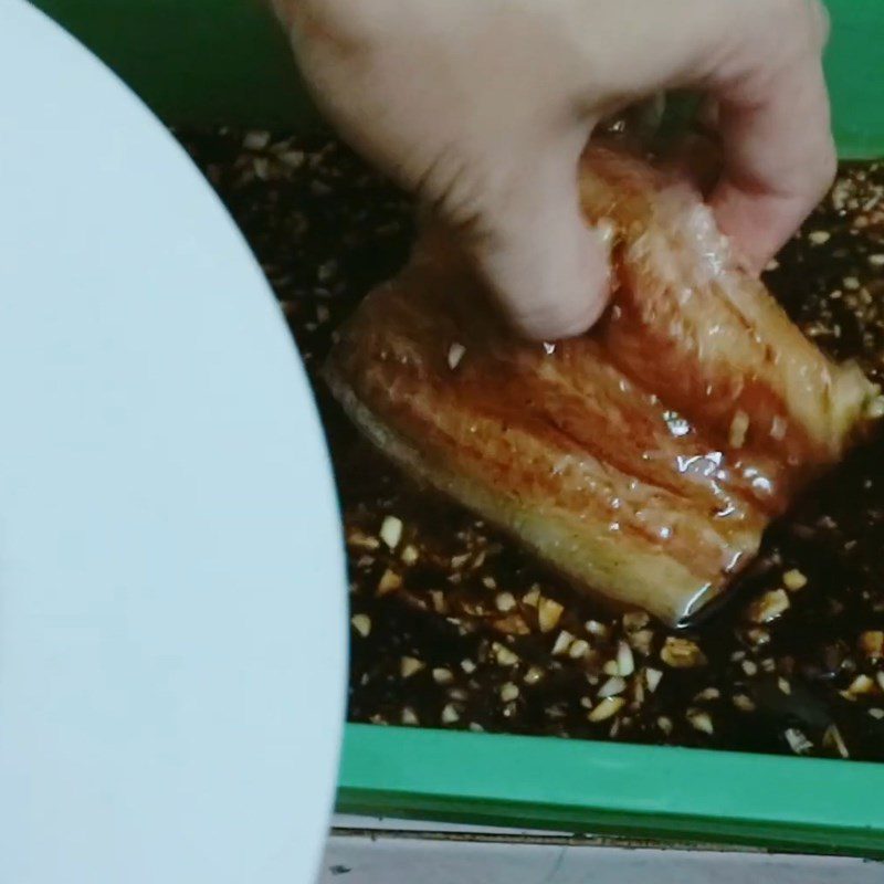 Step 3 Marinate snakehead fish Dried snakehead fish marinated with soy sauce