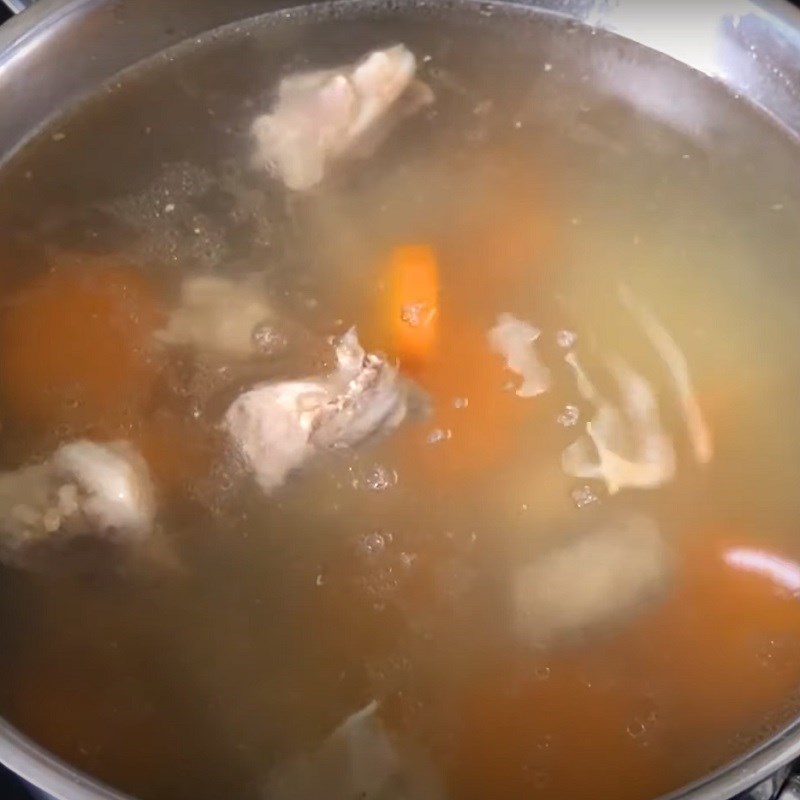 Step 2 Stewing bones for coconut milk noodle soup with fish cake