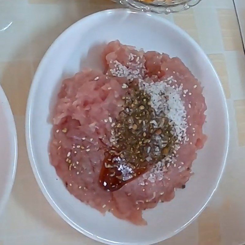 Step 2 Marinating the meat for Duck Egg Porridge