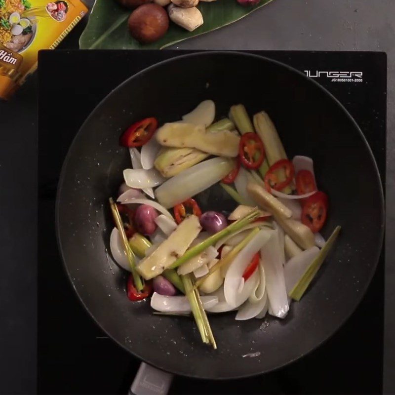 Step 2 Marinate the chicken for Spicy Sour Chicken Mushroom Hotpot