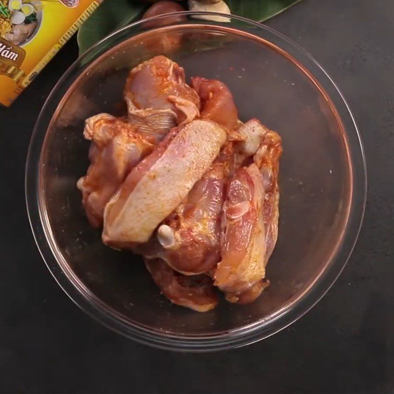 Step 2 Marinate the chicken for Spicy Sour Chicken Mushroom Hotpot