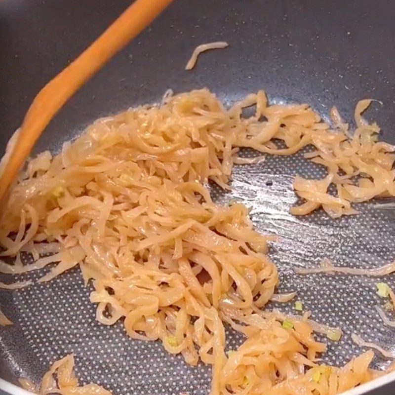 Step 4 Stir-fry mustard greens with salty vegetarian sticky rice (Recipe shared by Tiktok Vegetarian Kitchen XANH)