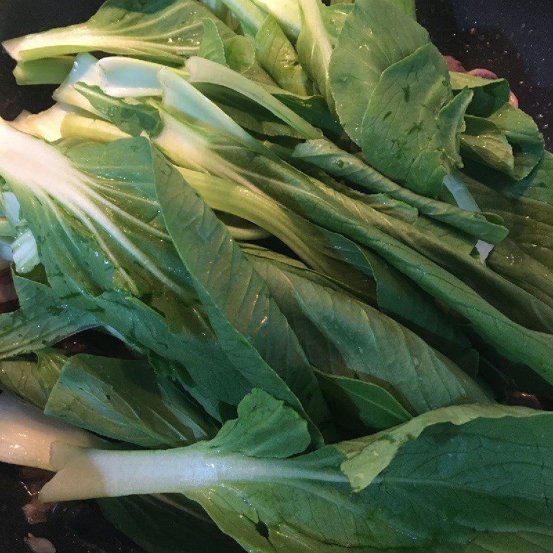 Step 2 Stir-fried chicken innards with bok choy Stir-fried bok choy with chicken innards