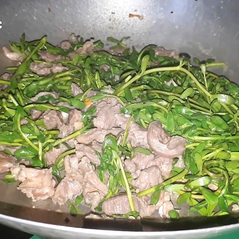 Step 4 Stir-frying the dish Stir-fried bitter vegetables with beef