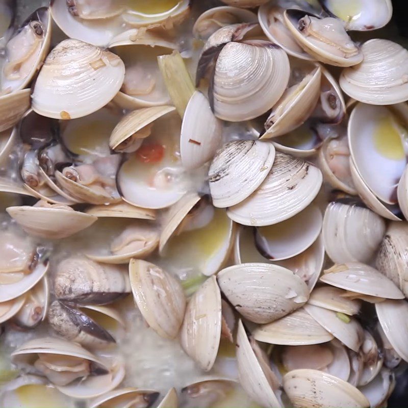 Step 2 Stir-fry the clams Clams stir-fried with butter, garlic, and coconut