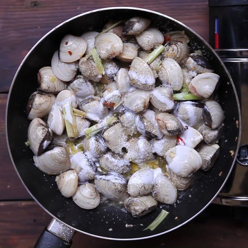 Step 2 Stir-fry the clams Clams stir-fried with butter, garlic, and coconut