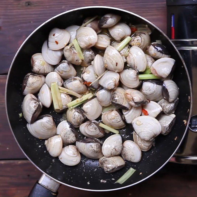 Step 2 Stir-fry the clams Clams stir-fried with butter, garlic, and coconut