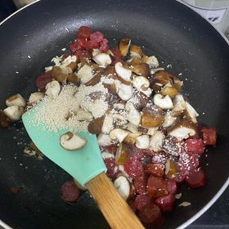 Step 2 Stir-fry sticky rice filling with pork floss and sausage