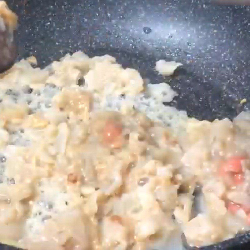 Step 4 Stir-fried scallops Sea cucumber scallop porridge