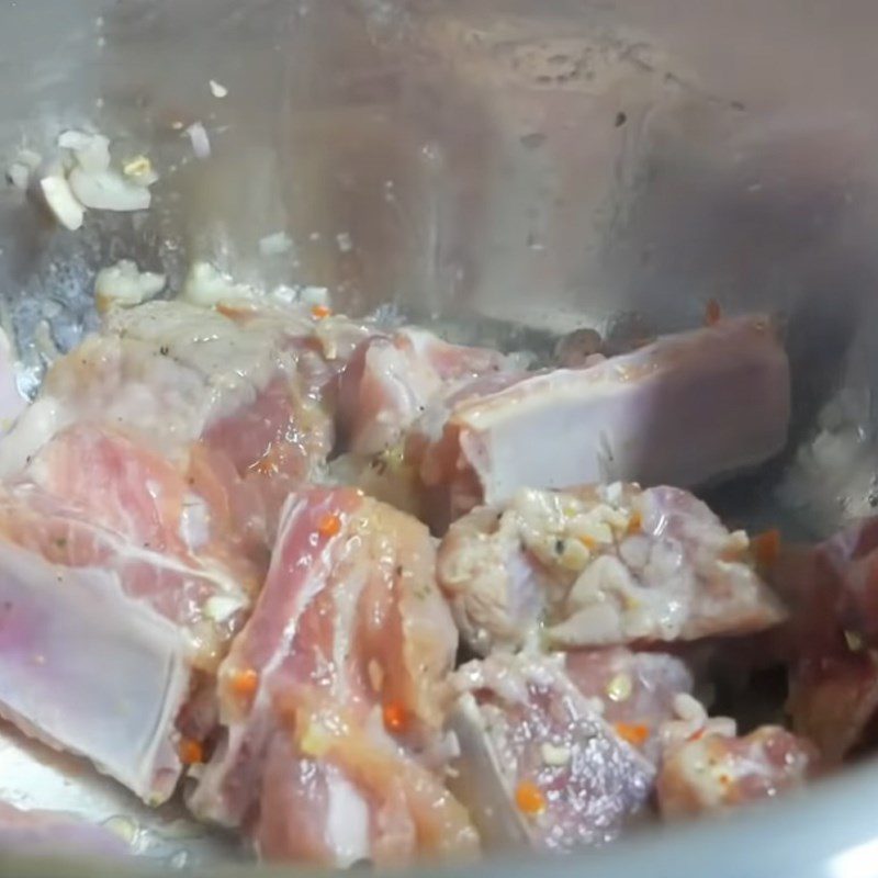 Step 2 Sautéing and Cooking Ribs for Rib Porridge using a pressure cooker