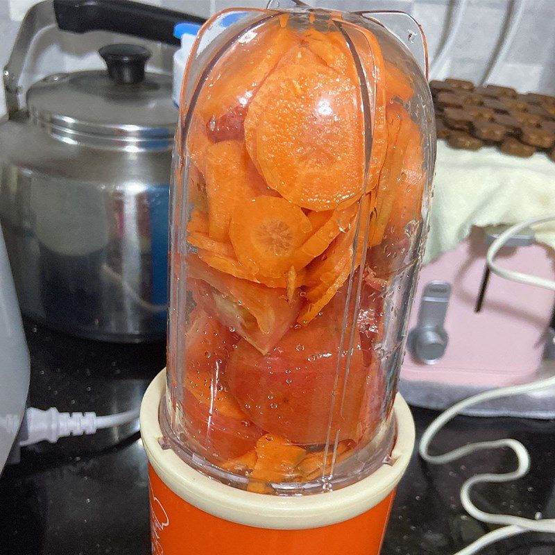 Step 2 Blend the mixture for Carrot and Tomato Juice with a Blender