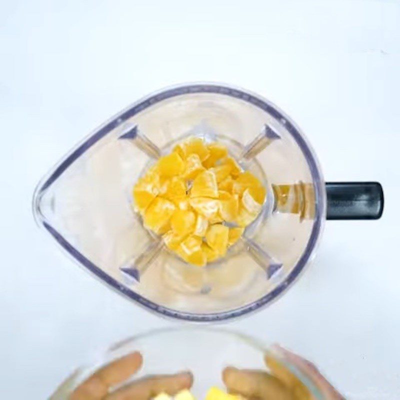 Step 2 Blend the smoothie for orange carrot mango smoothie