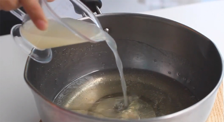 Step 2 Cook sugar syrup Candy lollipop with lemon and ginger