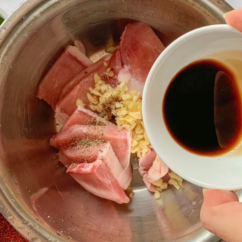 Step 1 Marinate the meat Salt and Chili Fried Pork