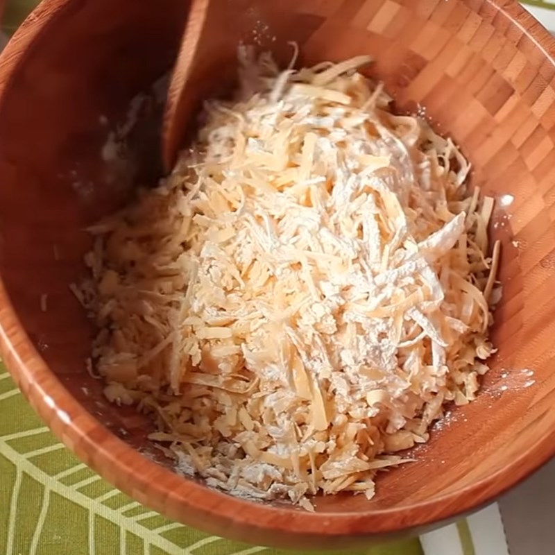 Step 1 Grate cheese for Cheese Fondue