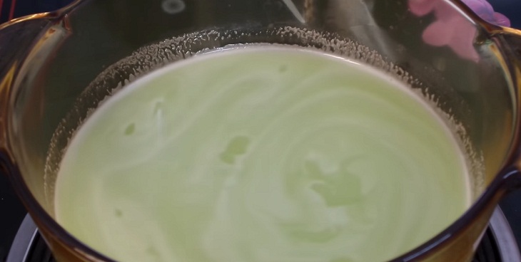 Step 2 Boil the coconut water for flattened rice mixed with coconut