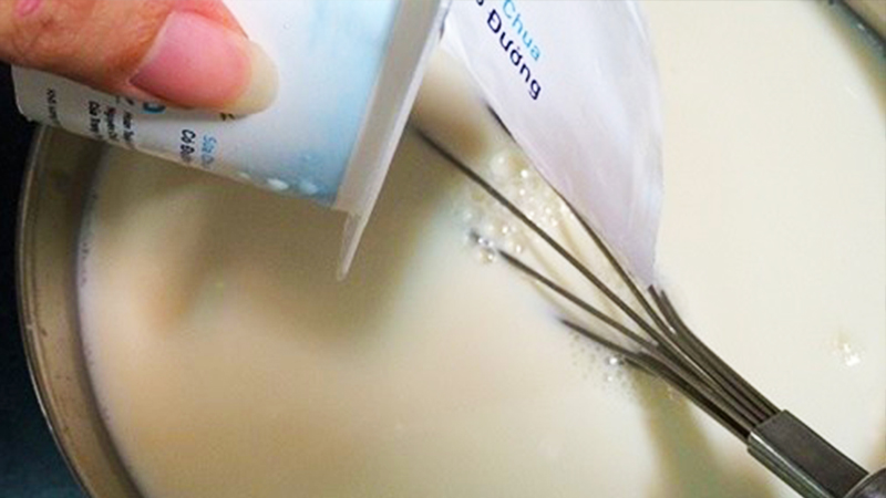 Step 1 Heat fresh milk and condensed milk for Inverted Yogurt