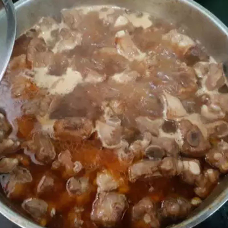 Step 4 Stir-fry and simmer pork ribs Corn porridge