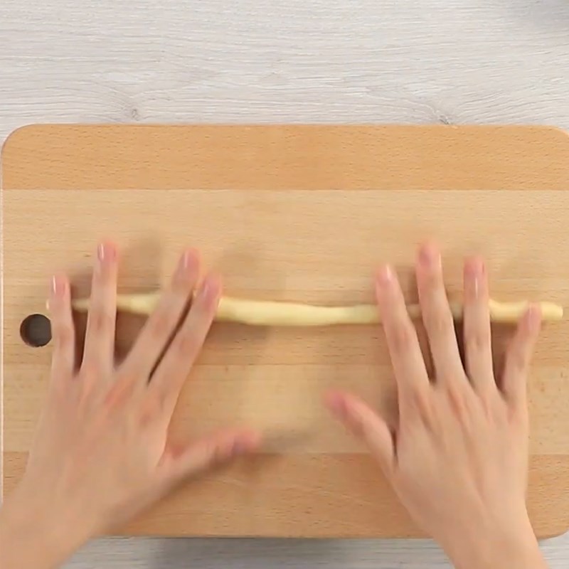 Step 4 Divide the dough and roll the Sausage Bread