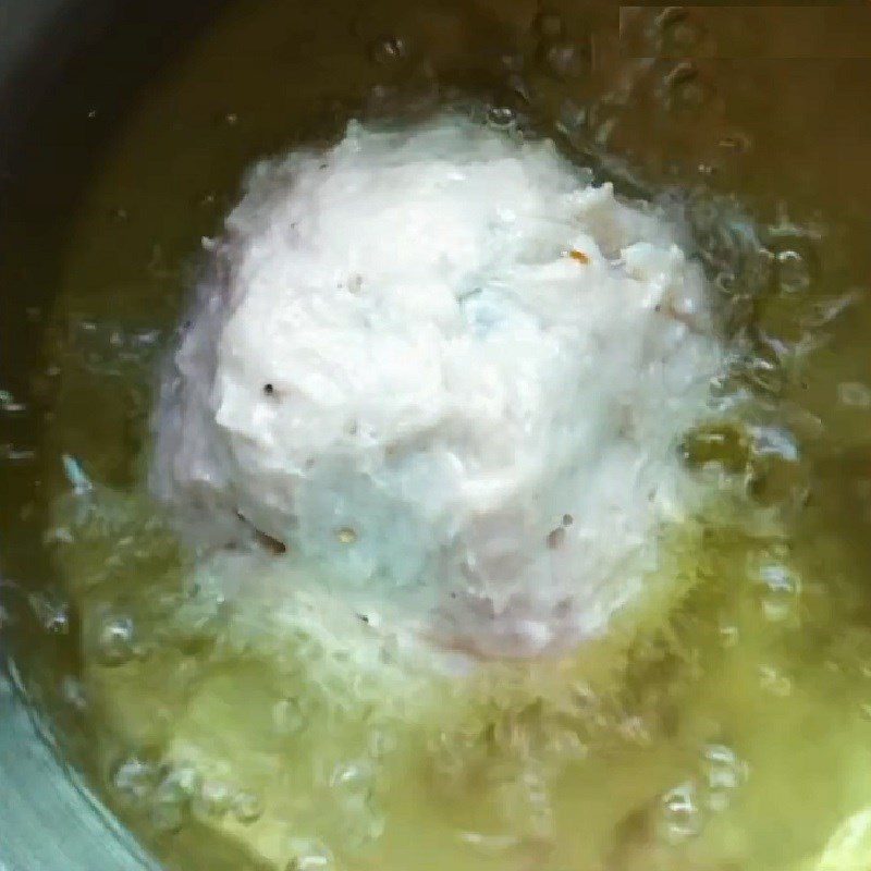 Step 3 Frying the fish cake Fish cake wrapped around preserved egg