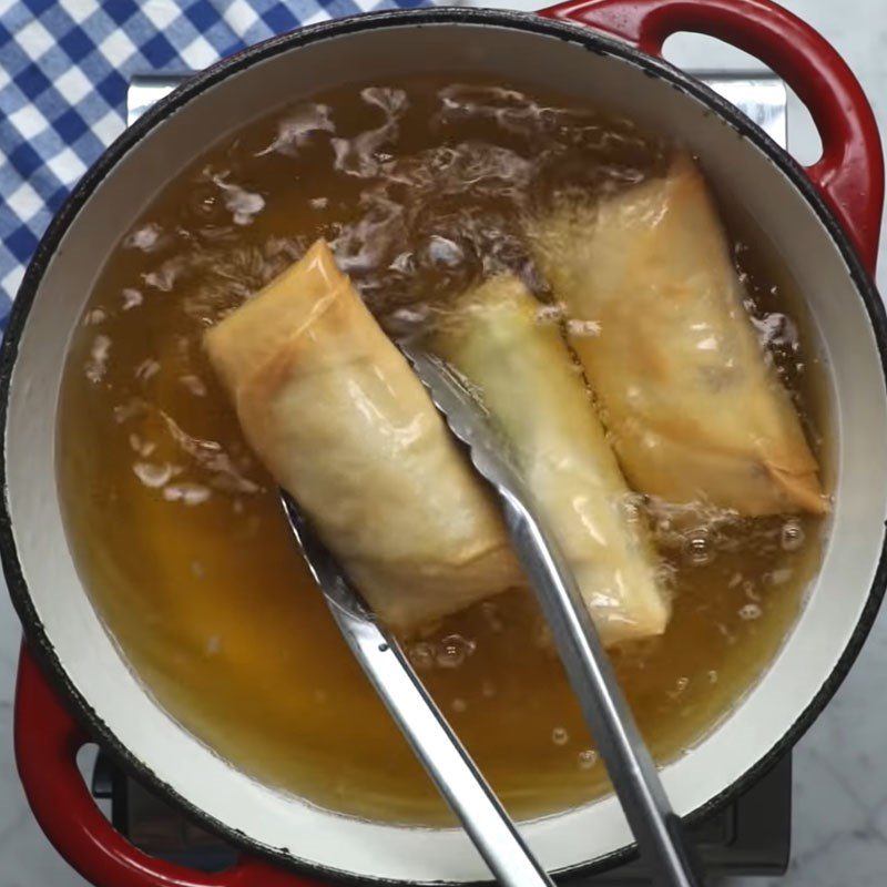 Step 5 Frying spring rolls Beef cheese spring rolls