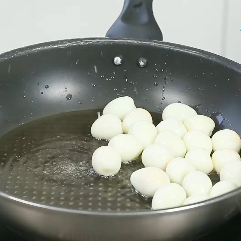Step 2 Fry quail eggs Quail eggs glazed with garlic butter