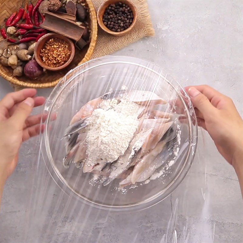Step 2 Marinate the salmon fins Fried Salmon Fin with Garlic and Chili