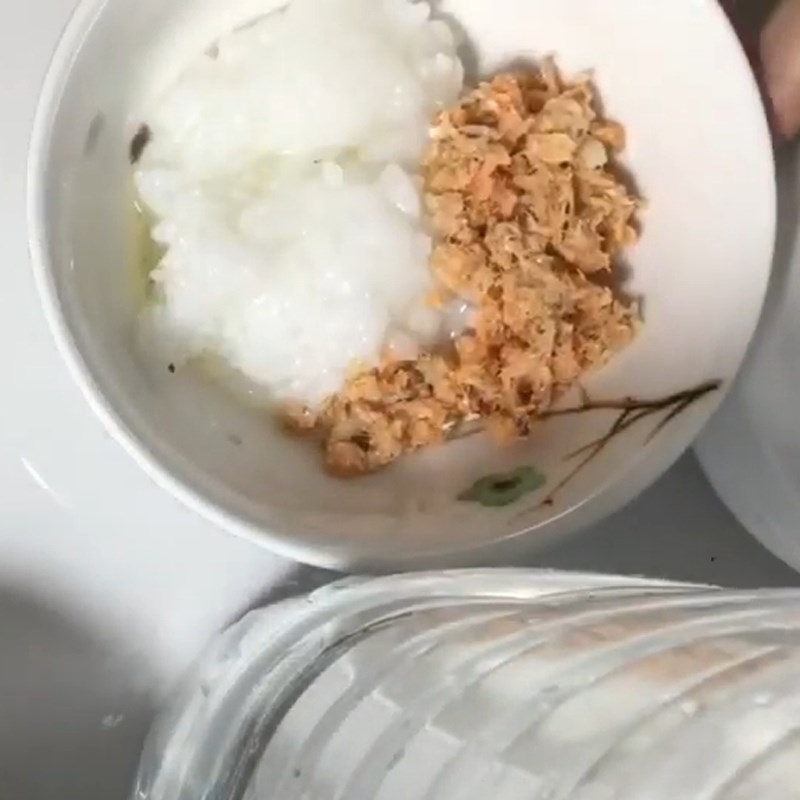 Step 5 Add pumpkin and minced fish into the prepared salmon pumpkin porridge