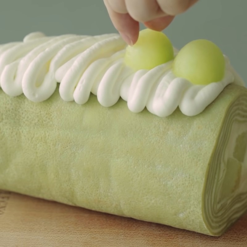 Step 6 Rolling the cake Melon crepe roll