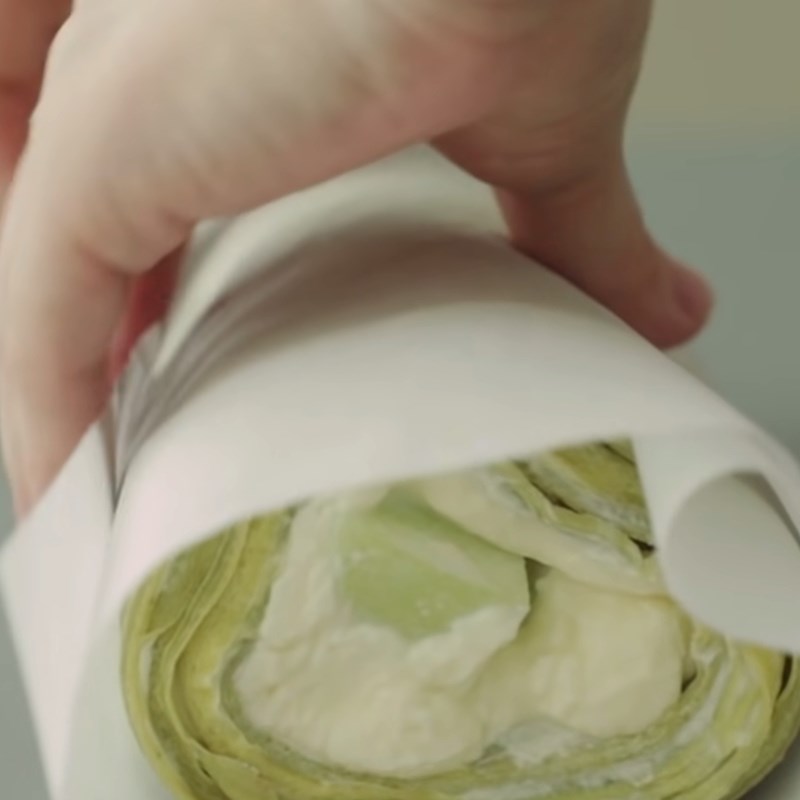 Step 6 Rolling the cake Melon crepe roll