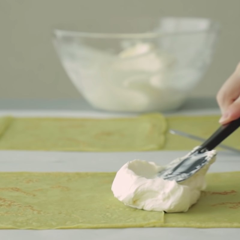 Step 6 Rolling the cake Melon crepe roll