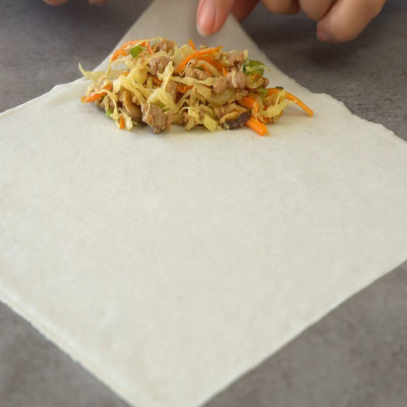 Step 7 Rolling the spring rolls for beef mushroom spring rolls